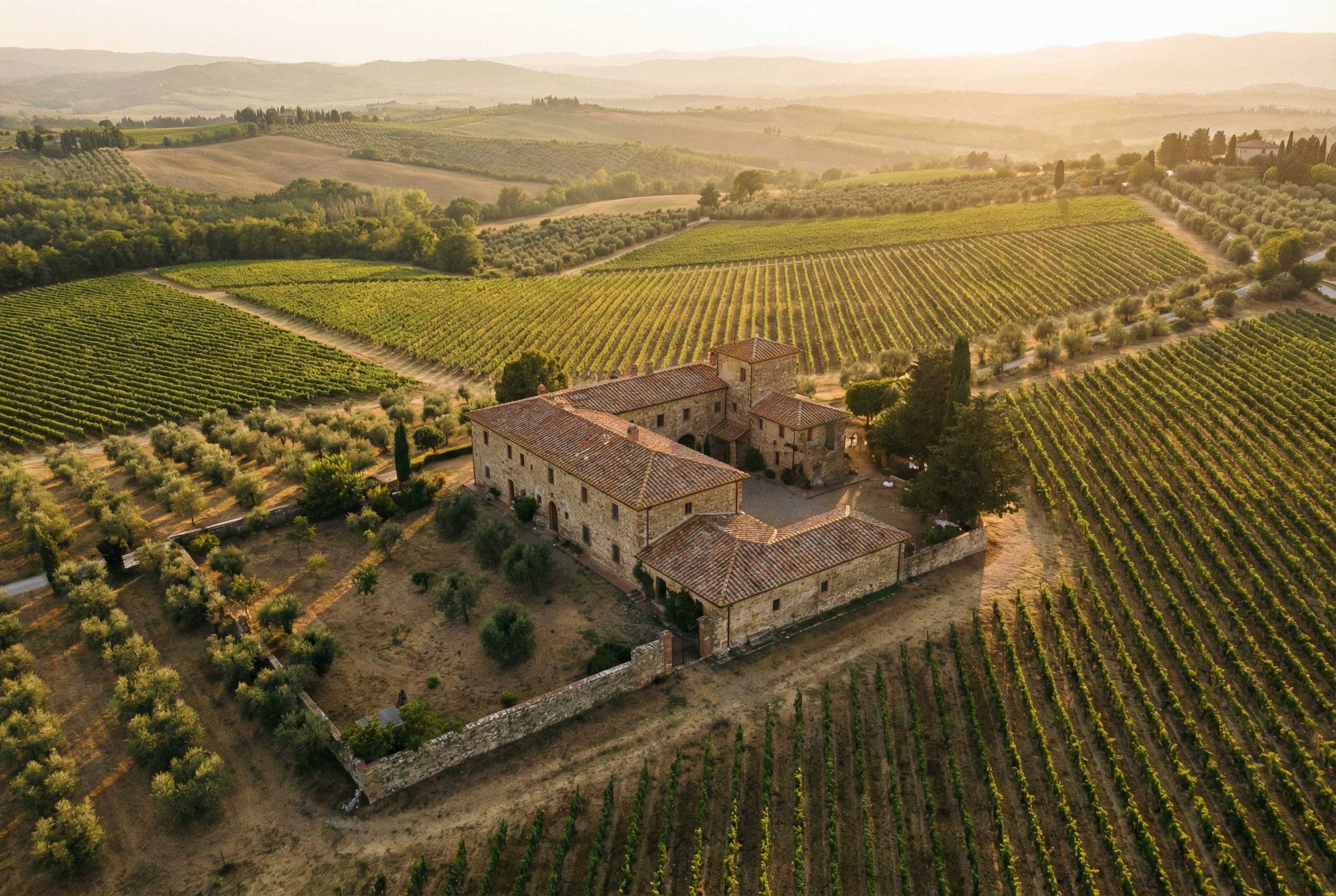 A private Tuscan estate surrounded by olive groves and vineyards.